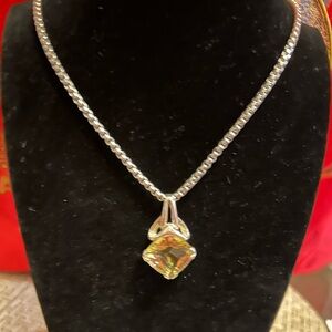 Elegant Silver Necklace with Yellow Pendant